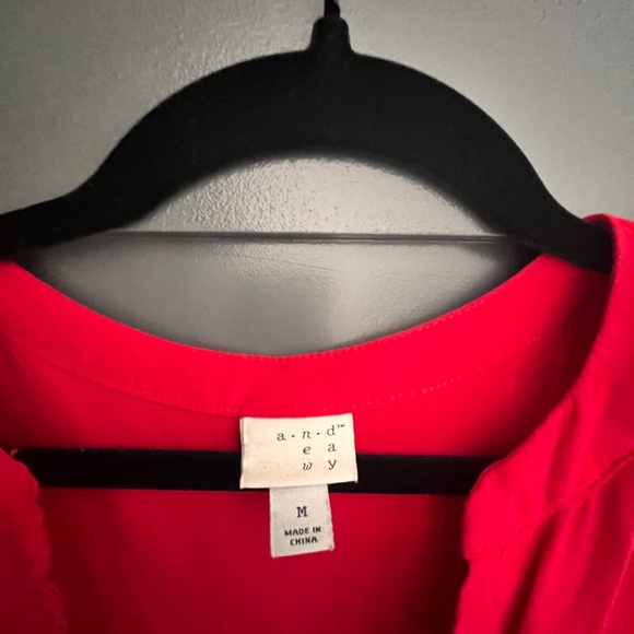 Red sleeveless top, ties in the front, hangs low on the back - Picture 3 of 7